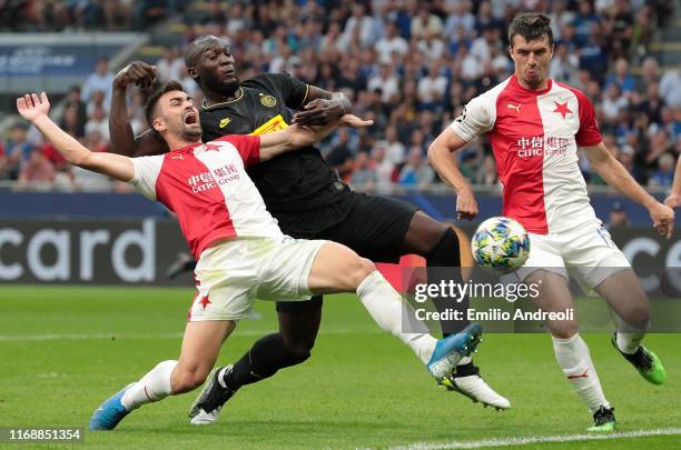Romelu Lukaku of FC Internazionale competes for the ball with David Hovorka and Ondrej Kudela of SK Slavia Praha during the UEFA Champions League...