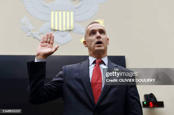 President Donald Trump's former campaign manager, Corey Lewandowski is sworn-in as he testifies during a House Judiciary Committee as part of a...