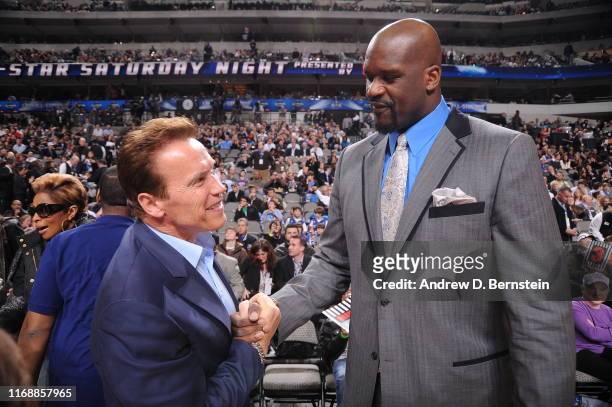 February 13: Arnold Schwarzenegger shakes hands with Shaquille O'Neal during the Haier Shooting Stars Competition as part of All Star Saturday Night...
