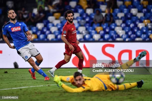 Liverpool's Egyptian midfielder Mohamed Salah fails to score past Napoli's Italian goalkeeper Alex Meret as Napoli's Greek defender Konstantinos...