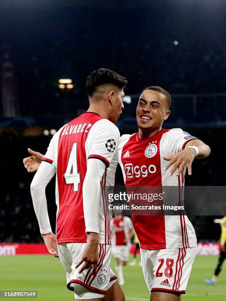 Edson Alvarez of Ajax celebrates 2-0 with Sergino Dest of Ajax during the UEFA Champions League match between Ajax v Lille at the Johan Cruijff Arena...
