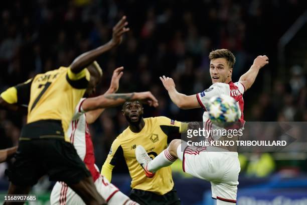 Ajax's Dutch defender Joel Veltman eyes the ball during the UEFA Champions league Group H football match between Ajax FC Amsterdam and LOSC Lille, at...