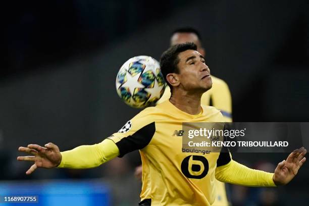 Lille's French midfileder Benjamin Andre controls the ball during the UEFA Champions league Group H football match between Ajax FC Amsterdam and LOSC...