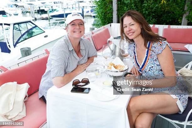 Paige Boller and a guest attend the Nicole Miller Walk N' Rosé Event With Group For The East End on August 18, 2019 in Sag Harbor, New York.