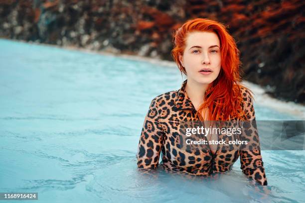 attractive woman in iceland - leopard print stock pictures, royalty-free photos & images