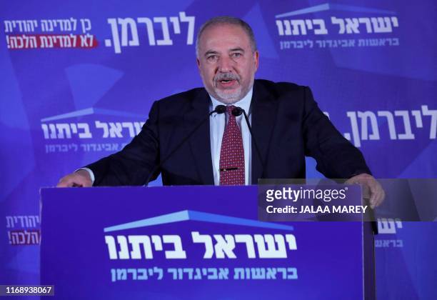 Avigdor Lieberman, leader of the Israeli secular nationalist Yisrael Beiteinu party, gives an address at the party's electoral headquarters in...
