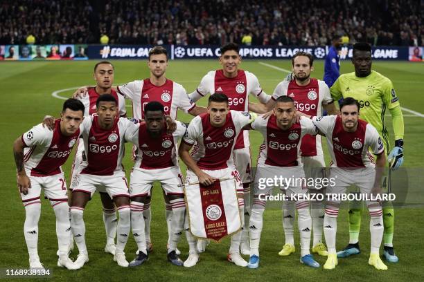 Ajax's team players Ajax'Argentinian defender Lisandro Martinez, Ajax's Brazilian forward David Neres, Ajax's Dutch forward Quincy Promes, Ajax's...