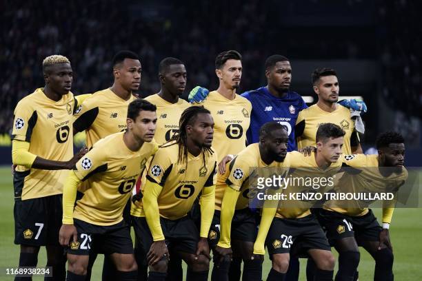 Lille's team players Lille's French midfileder Benjamin Andre, Lille's Portuguese midfielder Renato Sanches, Lille's French forward Jonathan Ikone,...