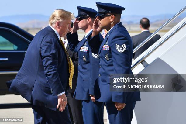 President Donald Trump boards Air Force one as he departs from Mountain View, California on September 17, 2019.