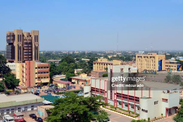 ouagadougou skyline - burkina faso - ouagadougou city center - skyline with the central bank of west african states (bceao) tower, the city hall, the social security and several other downtown government buildings - burkina faso - central bank of west african states stock pictures, royalty-free photos & images