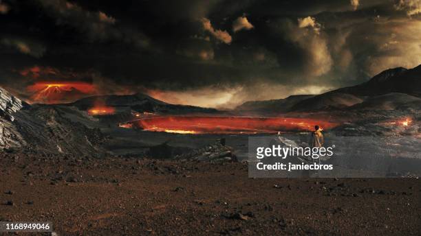 dark scenery of devastated planet. woman looking at volcanoes and meteors - dia do julgamento final imagens e fotografias de stock