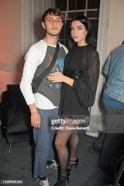 Anwar Hadid and Dua Lipa attend YSL New Fragrance 2019 UK launch party at Somerset House on September 17, 2019 in London, England.