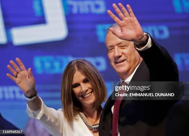 Benny Gantz , leader and candidate of the Israel Resilience party that is part of the Blue and White political alliance, waves to supporters...