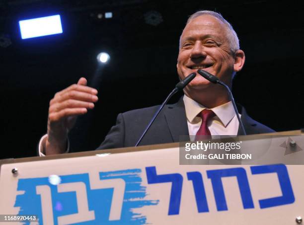 Benny Gantz, leader and candidate of the Israel Resilience party that is part of the Blue and White political alliance, addresses supporters at the...
