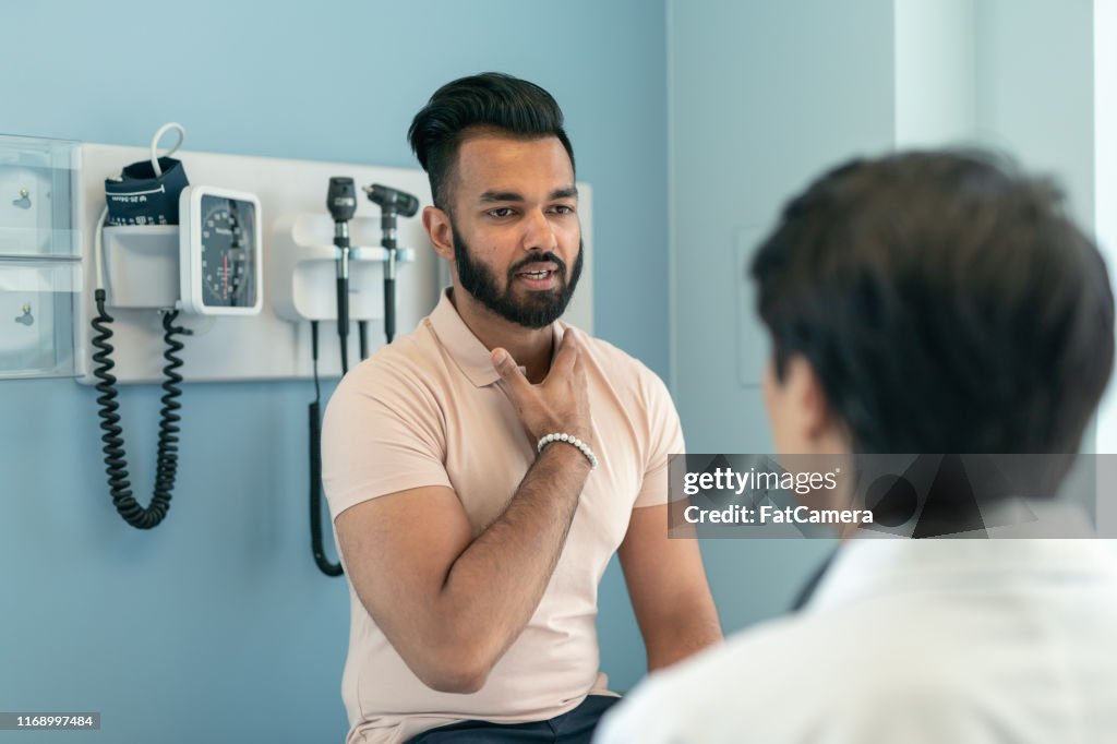 Young man in consultation with doctor