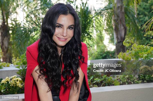 Actress Martha Higareda attends the Photo Call For Pantelion's 'Tod@s Caen' at the Beverly Wilshire Four Seasons Hotel on August 19, 2019 in Beverly...