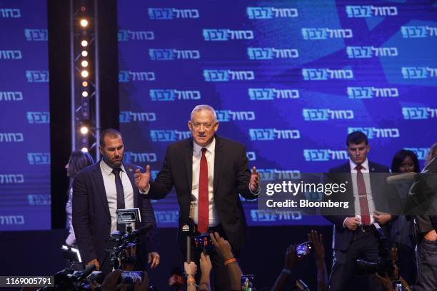 Benny Gantz, leader of the Blue and White party, center, speaks to his supporters in Tel Aviv, Israel, on Wednesday, Sept. 18, 2019. Israels election...