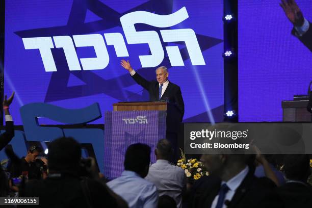 Benjamin Netanyahu, Israel's prime minister, greets attendees at the Likud party headquarters in Tel Aviv, Israel, early on Wednesday, Sept. 18,...