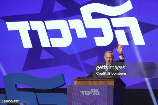 Benjamin Netanyahu, Israel's prime minister, greets attendees at the Likud party headquarters in Tel Aviv, Israel, early on Wednesday, Sept. 18,...