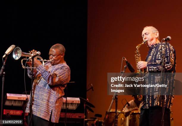 South African Jazz musician, composer, and activist Hugh Masekela plays flugelhorn, with Morris Goldberg on alto saxophone, during the 'Sounds of...