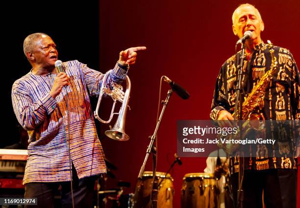South African Jazz musician, composer, and activist Hugh Masekela plays flugelhorn, with Morris Goldberg on alto saxophone, during the 'Sounds of...