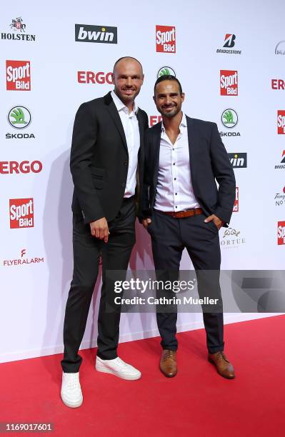 Heiko Westermann and Alexander Nouri attend the Sport Bild Award 2019 at the Fischauktionshalle on August 19, 2019 in Hamburg, Germany.