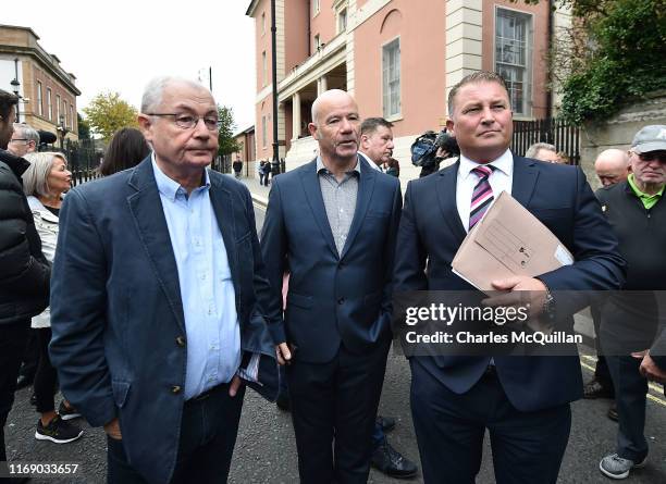 Michael McKinney and John McKinney , brother of Bloody Sunday victim William McKinney stand outside Derry Courthouse as the first listing of the case...