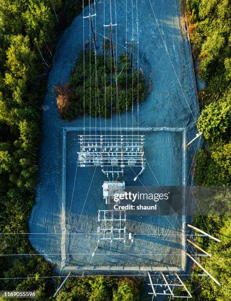 aerial drone view: power sub station - transformer imagens e fotografias de stock