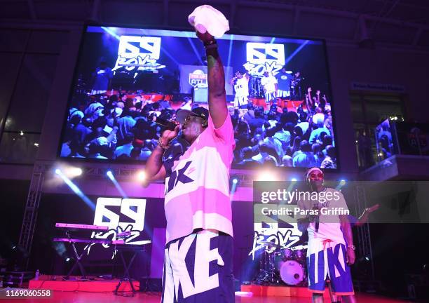 Thrill da Playa and Fast of 69 Boyz perform onstage during 5th Annual Tee Up ATL Party at College Football Hall of Fame on August 19, 2019 in...