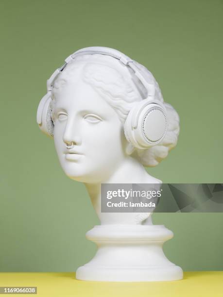 modern greek goddess with headphones - bust sculpture stock pictures, royalty-free photos & images