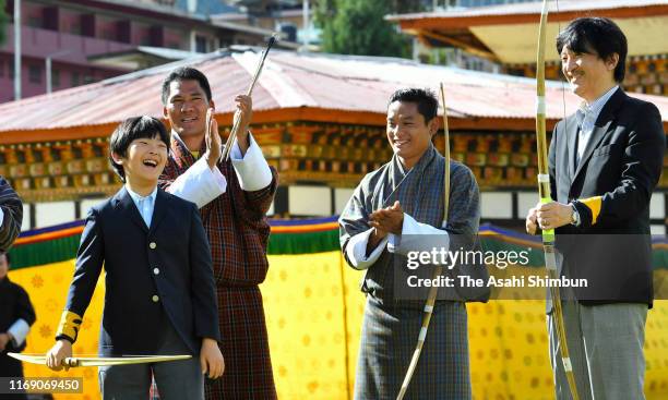 Prince Hisahito tries Bhutan's traditional archery while Crown Prince Fumihito, or Crown Prince Akishino at the Changlingmethang National Archery...