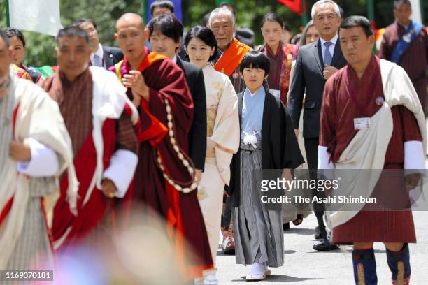 Crown Prince Fumihito, or Crown Prince Akishino, Crown Princess Kiko of Akishino and Prince Hisahito visit the Tashichho Dzong for their meeting with...