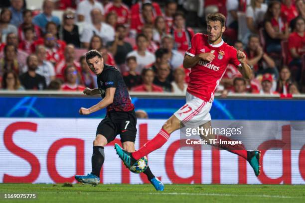 Marcel Sabitzer of RB Leipzig and Ferro of SL Benfica battle for the ball during the UEFA Champions League group G match between SL Benfica and RB...