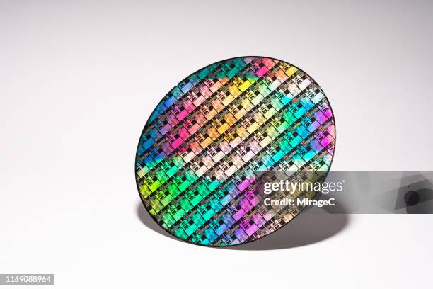 silicon computer wafer on white background - wafer stock pictures, royalty-free photos & images