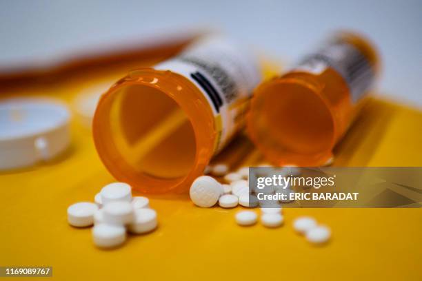 This illustration image shows tablets of opioid painkiller Oxycodone delivered on medical prescription taken on September 18, 2019 in Washington,DC....