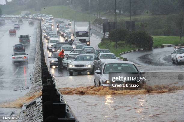 flooded roads - flood city stock pictures, royalty-free photos & images