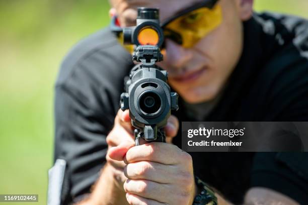 practicing at the shooting range - carbine stock pictures, royalty-free photos & images