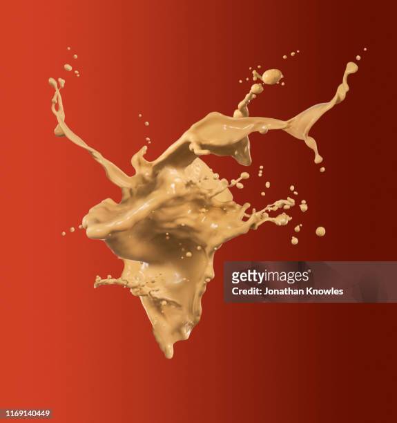 creamy liquid splash in air - cream splash stockfoto's en -beelden