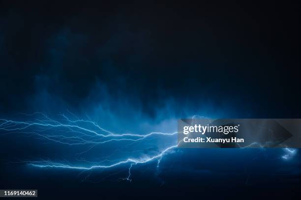 lightning in the night sky - thunderstorm stock pictures, royalty-free photos & images