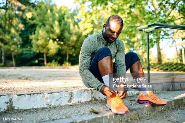 put on the shoes and go run - tied up stock pictures, royalty-free photos & images