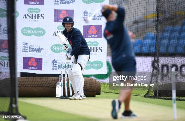 Joe Denly of England receives throwdowns during a nets session at Headingley on August 20, 2019 in Leeds, England.