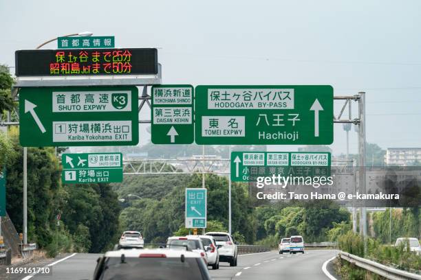 road direction board on urban highway in japan - road sign board 個照片及圖片檔