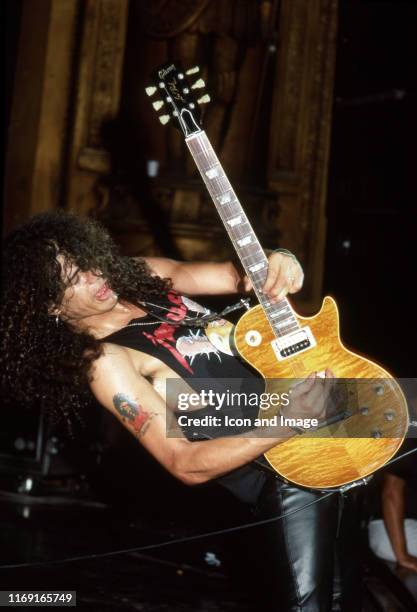 British-American musician, songwriter and lead guitarist for Guns N' Roses, Slash, playing his iconic Gibson Les Paul during the Appetite For...