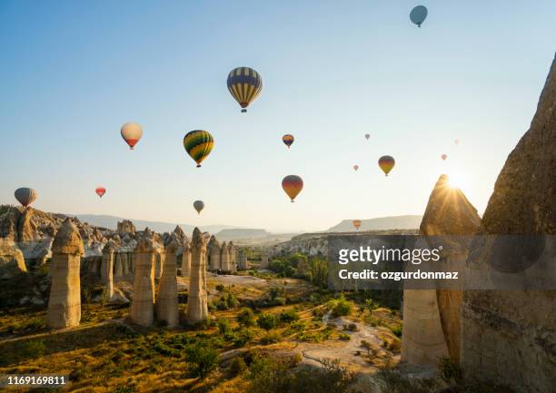 cappadocia, central anatolia, turkey - cappadocia hot air balloon stock pictures, royalty-free photos & images