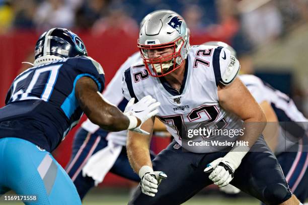 Dan Skipper of the New England Patriots blocks during a game against the Tennessee Titans during week two of the preseason at Nissan Stadium on...