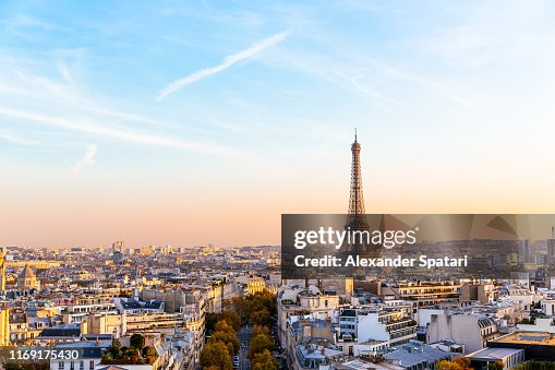 Paris cityscape with Eiffel Tower at sunset, Ile-de-France, France Paris cityscape with Eiffel Tower at sunset, Ile-de-France, France