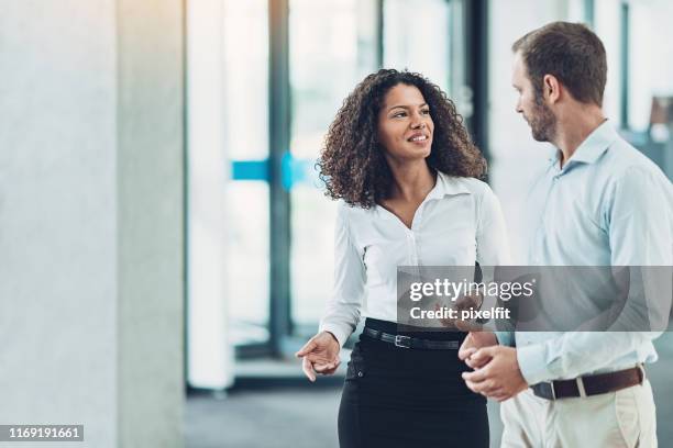 partners in business - women side by side stock pictures, royalty-free photos & images