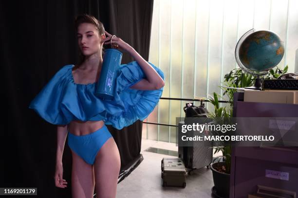 Model presents a backstage "First Look" creation of Annakiki's Women's Spring Summer 2020 collection in Milan on September 18, 2019.