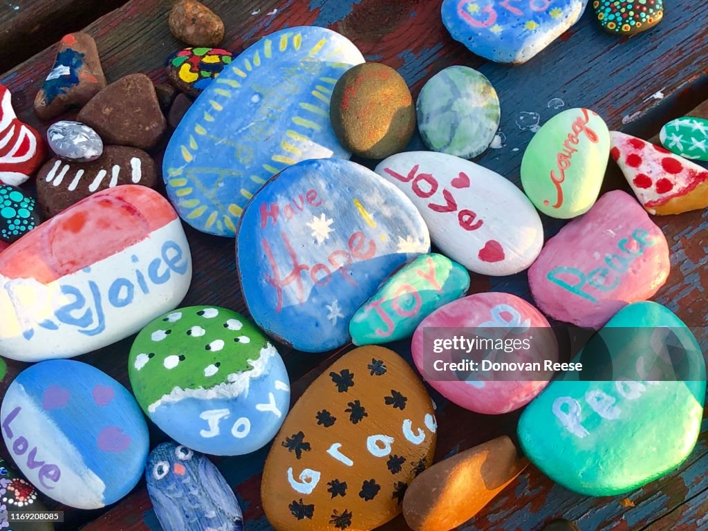 Inspirational sayings on painted rocks