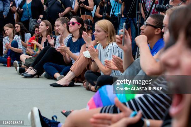 Swedish environment activist Greta Thunberg and other teenagers gather outside the US Supreme Court to support the children's climate lawsuit against...